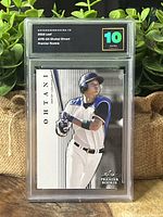 Front of slab showing Shohei Ohtani batting in Nippon-Ham Fighters uniform with AG10 label