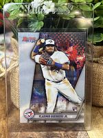 Front view of Vladimir Guerrero Jr. rookie card in protective Ultra PRO sleeve, showing player in Toronto Blue Jays uniform with vibrant design.