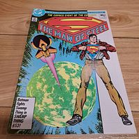 Front cover photo of The Man of Steel No. 1 comic book showing Superman in iconic pose with event text and pricing details.