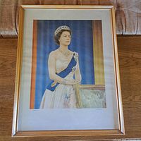 Front view of the framed print depicting Queen Elizabeth II in a formal portrait