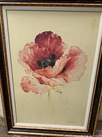 Full view of framed floral print showing red poppy with crackled ivory background and vintage gold-black frame.