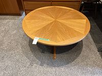 Front perspective showing top and pedestal base