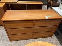 Front view of the dresser showcasing six drawers