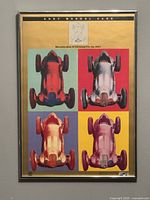 Front view of framed Andy Warhol car print showing four colorful images of a vintage race car.