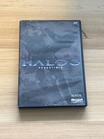 Black Xbox 360 Halo 3 Essentials game case front cover with Master Chief art and logos.