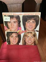 Front cover of the Bay City Rollers Greatest Hits vinyl LP showing band member portraits.