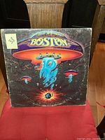 Front cover of Boston self-titled album showing stylized spaceship artwork.