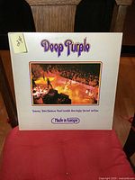 Front cover of Deep Purple 'Made in Europe' vinyl LP showing band photo on stage with audience and album title in purple font.