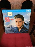 Front cover of Elvis Presley Christmas Album LP showing portrait of Elvis and title text.