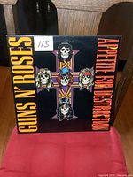 Front cover of Guns N' Roses Appetite for Destruction LP showing iconic skull cross artwork and band name.