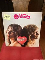 Front album cover showing band members' profile photo with Heart logo and Dreamboat Annie title inside a heart shape.