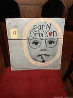 Front cover of the "Early Orbison" vinyl LP album showing the baby face design and title.