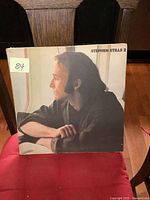 Front cover of Stephen Stills 2 album featuring side profile image of Stephen Stills looking out an airplane window.