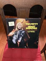 Front cover of the Tom Petty and the Heartbreakers double LP, visible minor wear, shows Tom Petty performing.