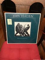 Front cover of the Van Halen vinyl LP album titled 'Women and Children First', showing band photo and album title.