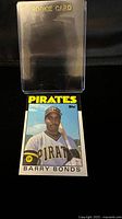 Photo of the Barry Bonds rookie card outside the plastic case showing the front of the card with player image and details.