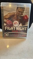 Front view of factory sealed Fight Night Round 3 PS3 game