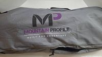 Carrying bag for Mountain Profile snowshoes showing brand logo and slogan.