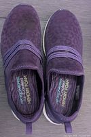 Top-down photo showing overall style, color, and embellishments of the shoes.