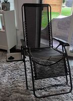 Full view of zero gravity chair with breathable mesh and steel frame, showing attached side table with cup holder on left side.