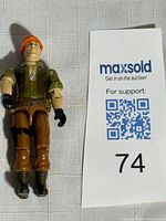 Front view of the 1984 GI Joe Tollbooth action figure, showing detailed clothing and orange helmet.