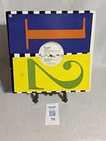 Front and back colorful record sleeve of New Order's 12 inch vinyl single 'Thieves Like Us' from 1986.