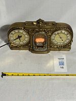 Front view of complete unit with scale showing overall size and condition