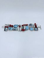 Bracelet laid flat showing the full length with all stones and beads visible