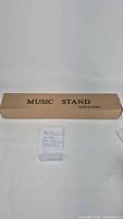 Image of the original cardboard box labeled 'Music Stand'.