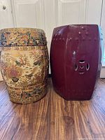 Both ceramic end tables side by side showing shape and finish