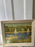 Framed lithograph of Monet's Bassin d'Argenteuil showing overall artwork and frame.