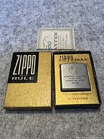 Photo of the vintage Richmond Hill Tool & Die Zippo lighter in original box with guarantee card.