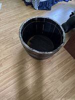 Top view of the large wooden barrel planter showing spacious interior and wood grain.