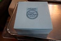 Box showing Noritake Gala Cuisine brand name and logo.