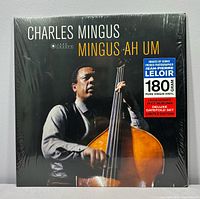 Front cover sealed in shrink showing album art, 180 g sticker