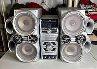 Front view of complete JVC HX-D7 system showing receiver and both speakers