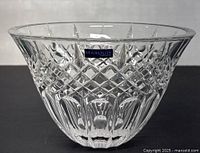 Front view of the signed Marquis by Waterford crystal bowl with visible original label on the rim.