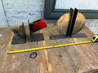 Overview of both bookend pairs with measuring tape showing scale