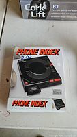 Front box of the black rotary phone index with 'Phone Index' branding and Horizon logo