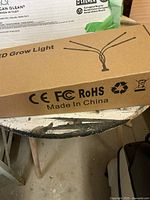 Box labeled 'LED Grow Light', showing the product type and certifications CE, FCC, RoHS, Made in China