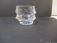 Front and side view of the Iceberg crystal whisky glass showing textured sculpted pattern