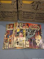 Vintage Marvel comic books laid out overlapped showing Cloak & Dagger covers prominently with character art and Marvel branding.
