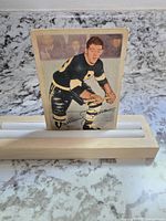 Front view of the 1953-54 Parkhurst Johnny Peirson hockey card showing player image and facsimile signature.