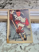 Front of vintage 1953-54 Parkhurst Hy Buller hockey card showing player in New York Rangers uniform with the name and autograph printed.