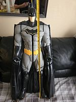Front view of the large Batman figure showing its height measurement over 33 inches tall.