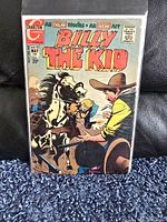 Front cover of vintage Billy the Kid comic book issue #93, showing colorful Western-themed cover art, in protective plastic bag with backing board.