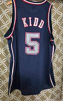 Back of the navy blue mesh jersey showing 'KIDD' and number 5