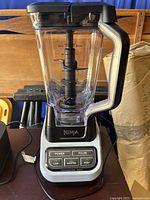 Ninja Professional Power Blender CO650B with 72 oz clear pitcher, black multi-level blades, and control panel with power, pulse, low, auto smoothie, and high settings.