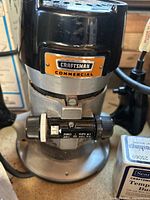 Close-up of Craftsman commercial router logo and body