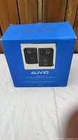 Boxed Auvio speakers showing front and top branding.